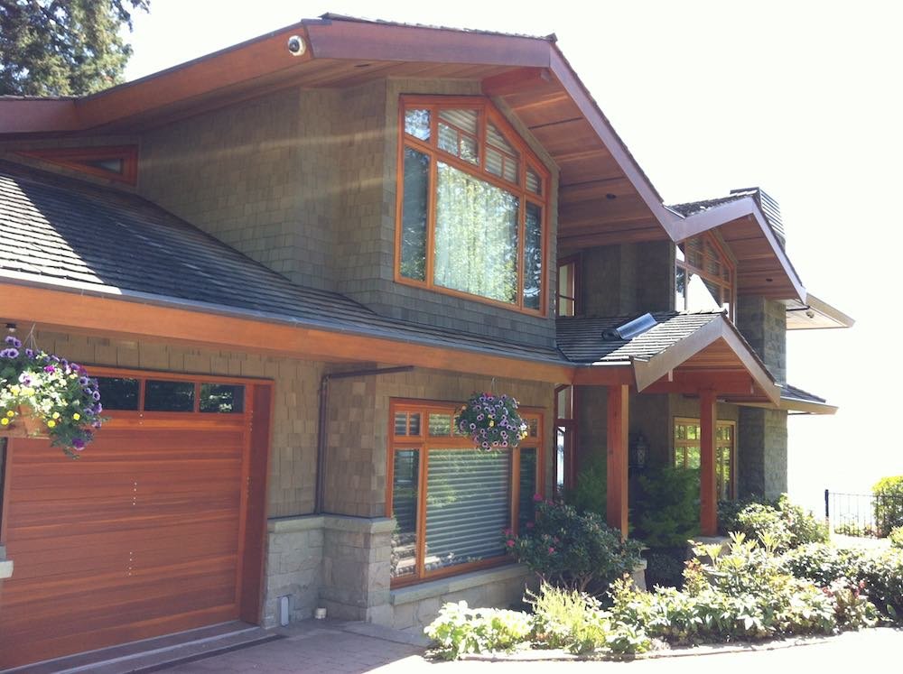 Hidden Gutter Repair | West Vancouver Home - this image shows how the hidden gutters add a home's profile.