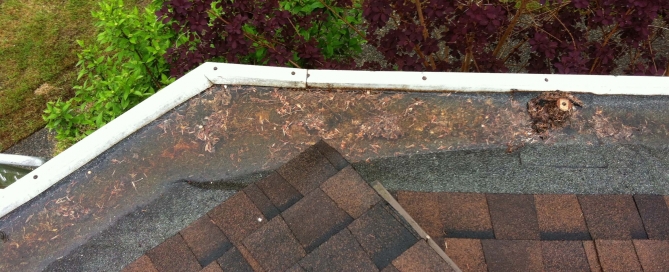 5 signs for gutter replacement - this hidden gutter system is misaligned and won't drain