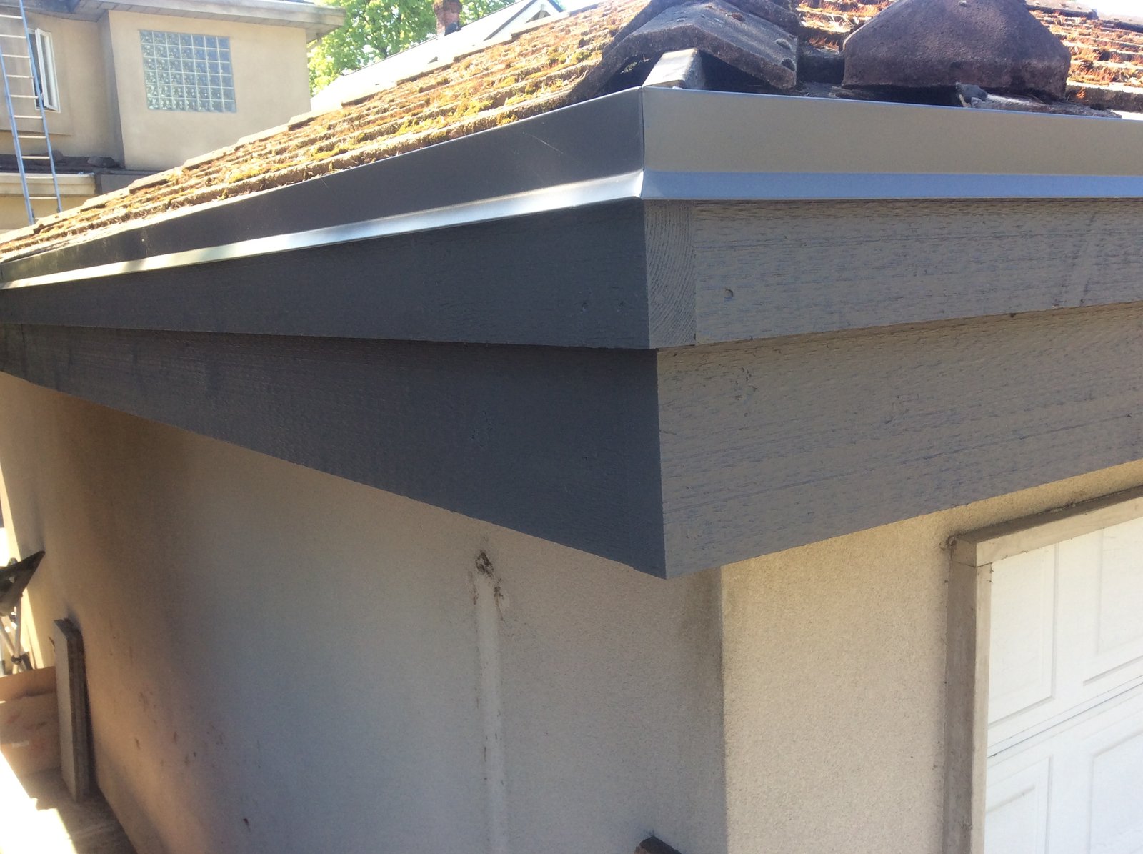 Hidden Gutter Repair for Kitsilano Home - Restored Facia Board and Gutter System