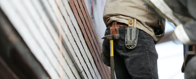 guy repairing gutters