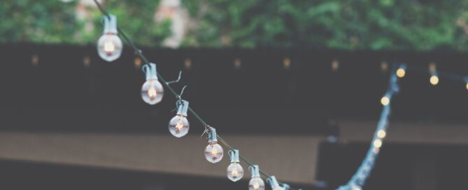 strings lights hanging from gutters